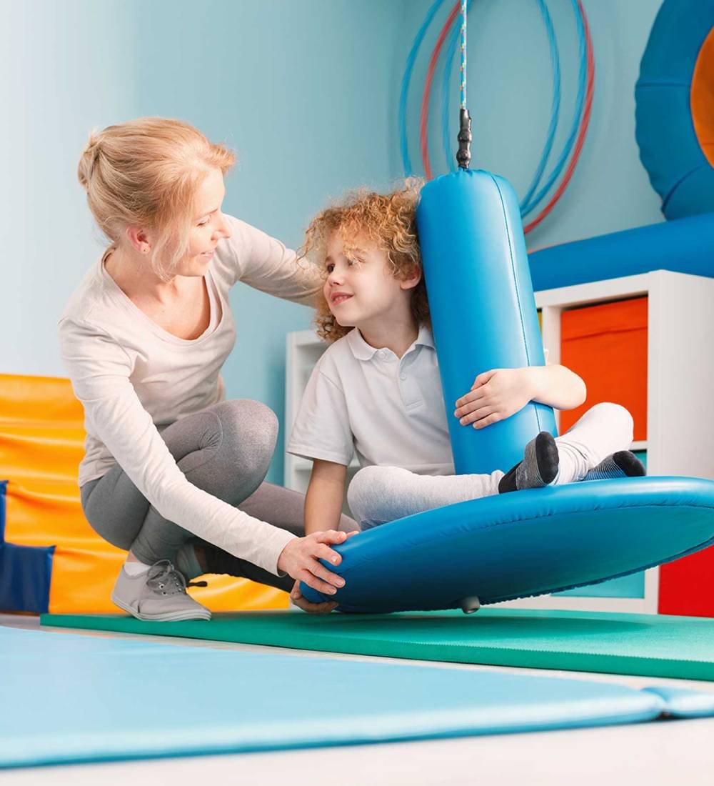 boy-using-sensory-integration-equipment